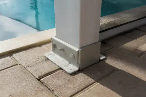 Pool cage cost in Lakeland, FL: aluminum post anchored into a paver deck