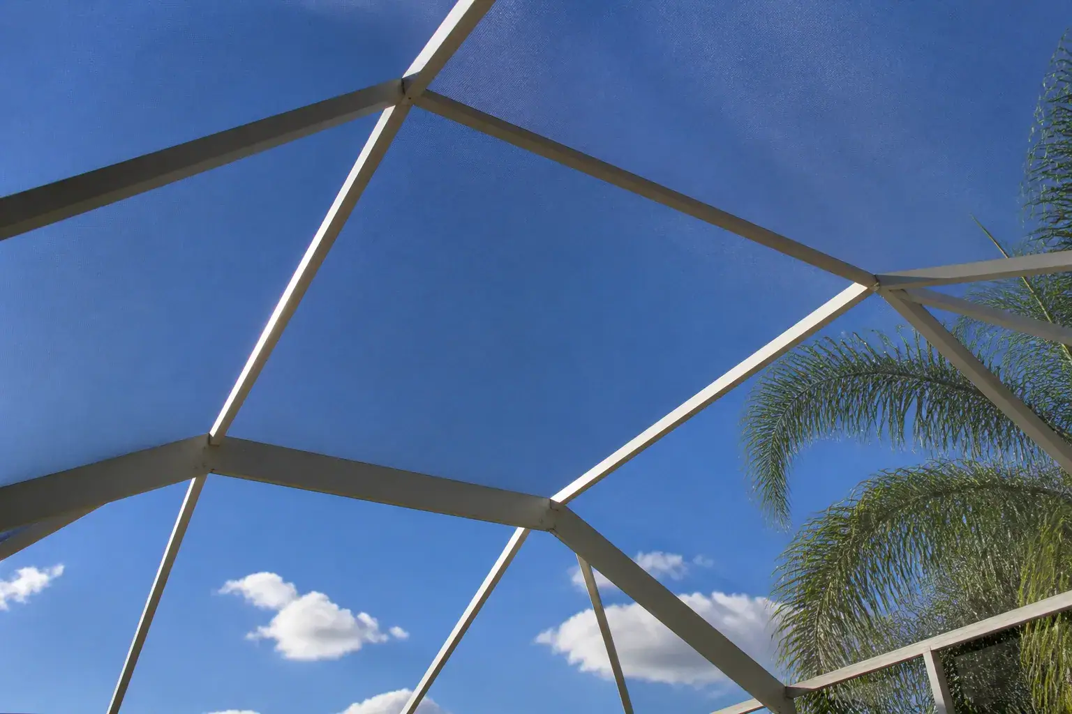 Pool cage roof in Lakeland, FL, mansard aluminum beams and screen