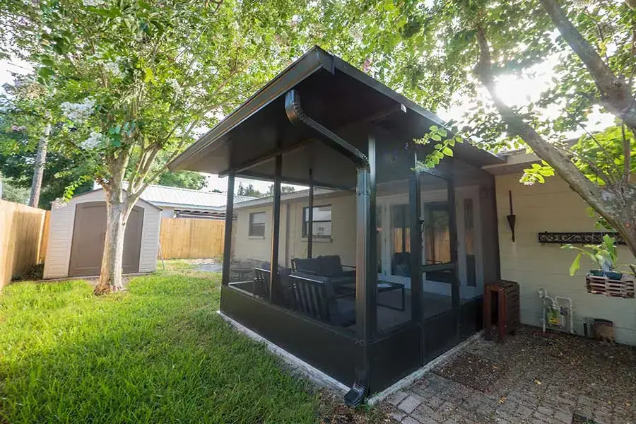 Screen room exterior seen from the backyard