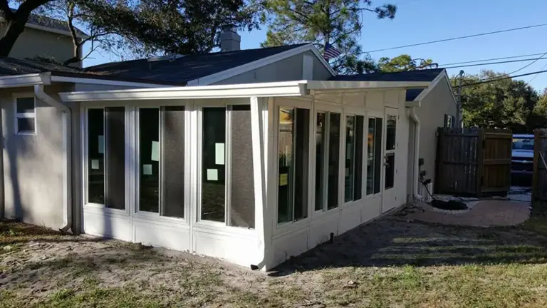 Aluminum sunroom addition with insulated glass windows