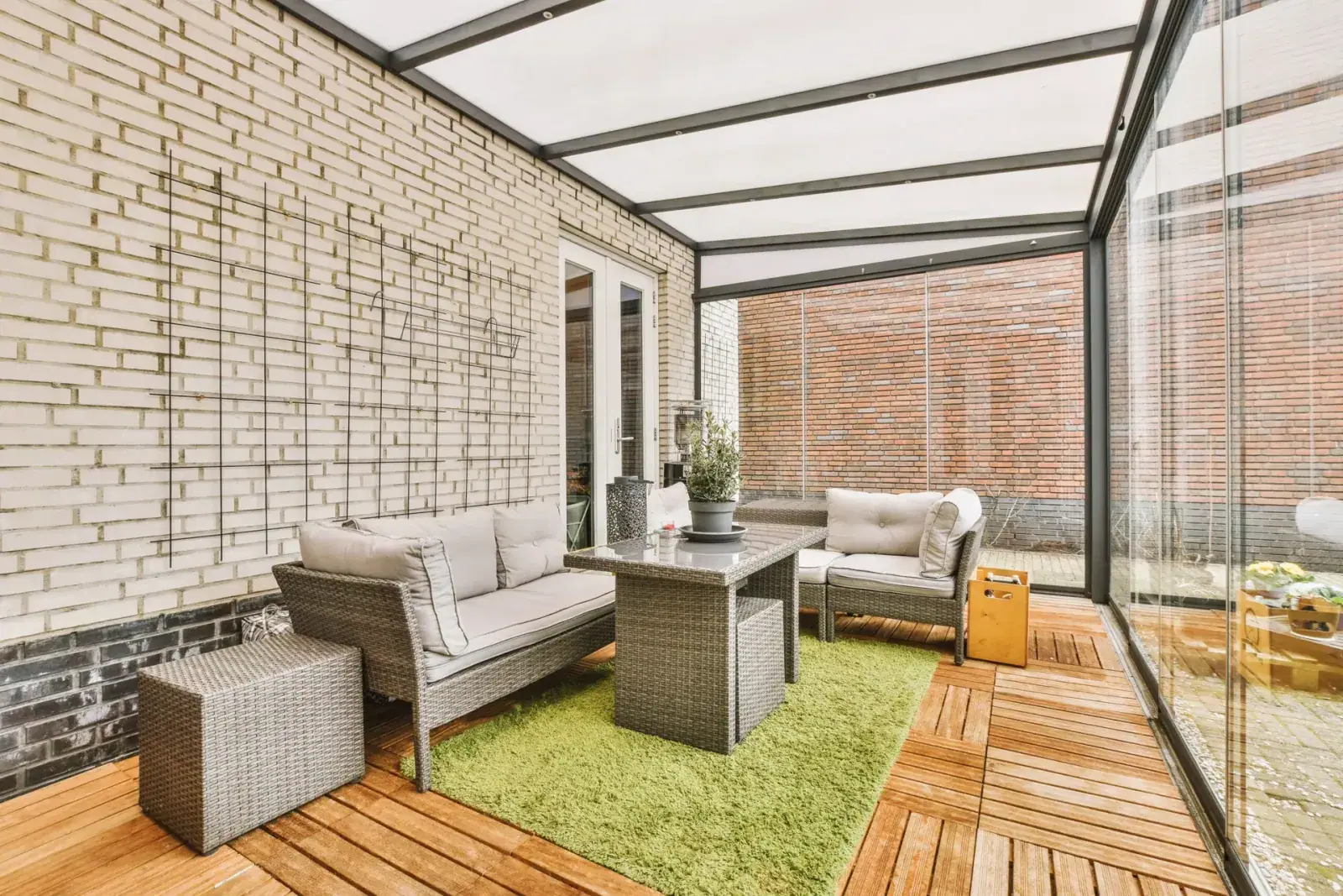 Neat covered patio with an outdoor sitting area